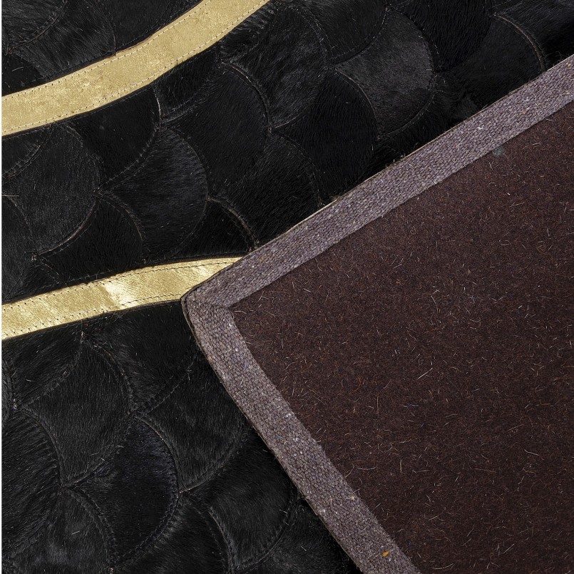 Zwart en goud koeienhuid vloerkleed - Fulmine - Kare Design